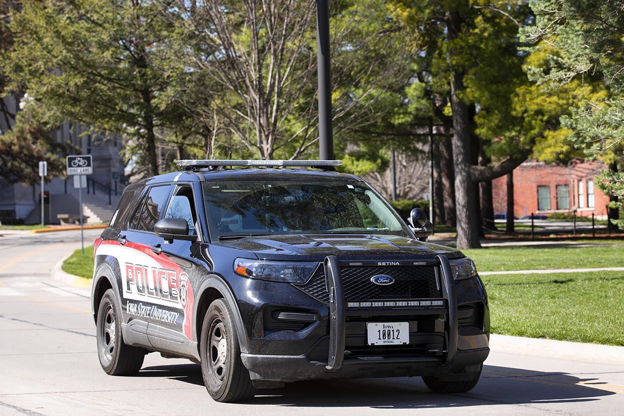 ISU Police car driving on a campus street