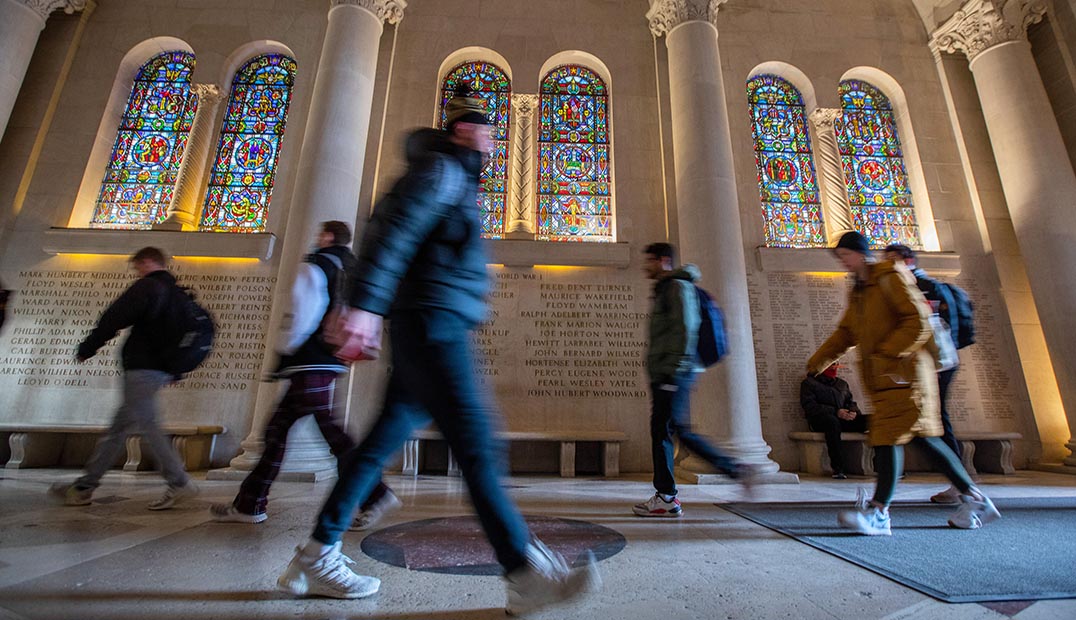 Students pass each other in the Memorial Union Gold Star Hall