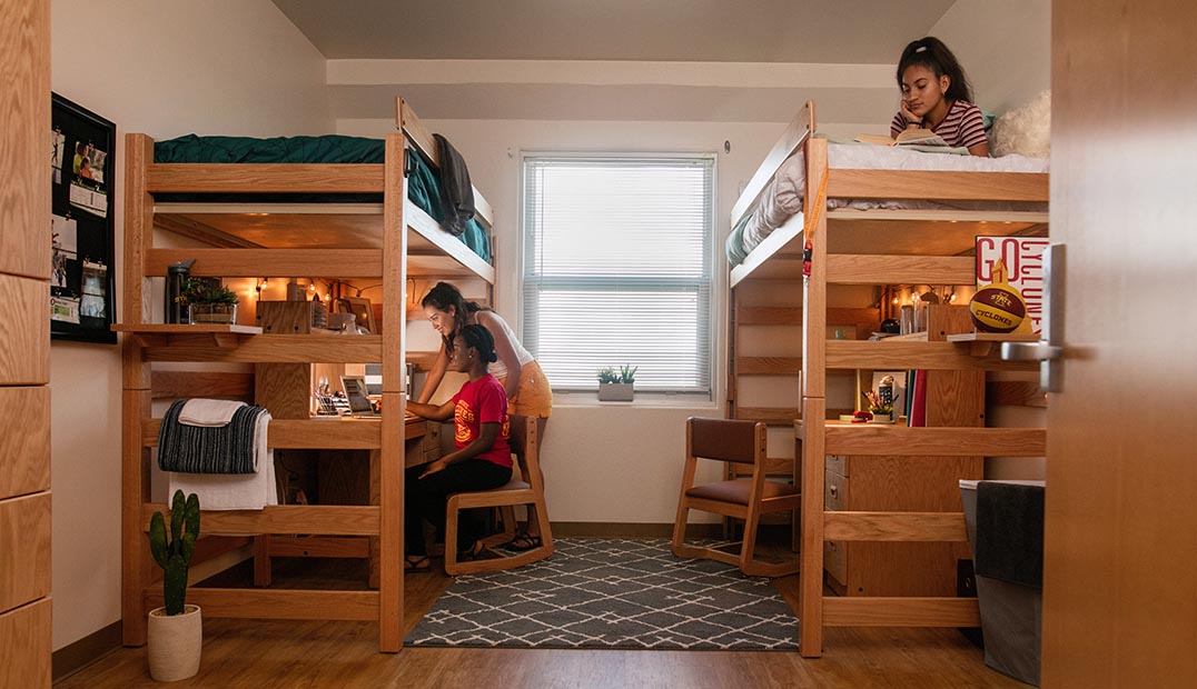 Students hanging out in a residence hall room