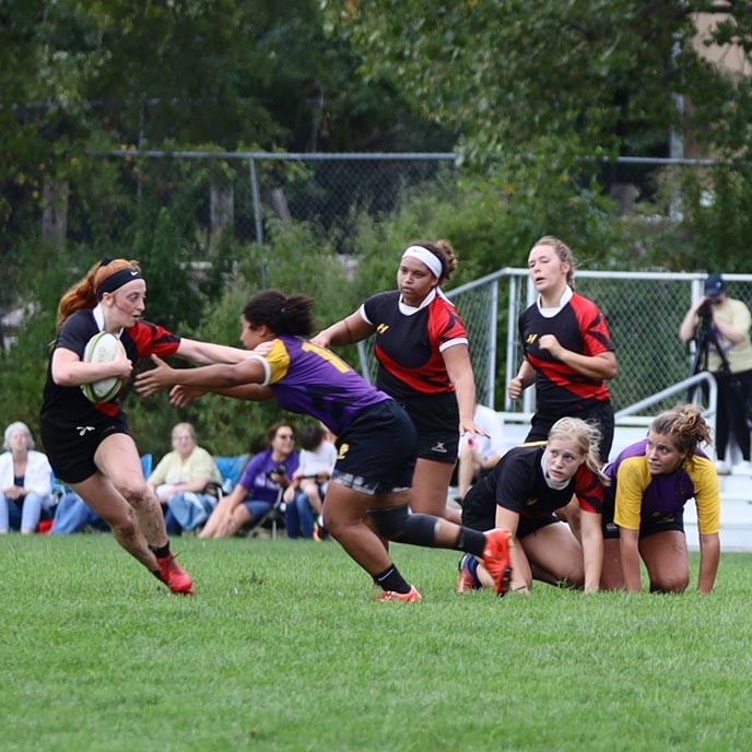 Women playing rugby