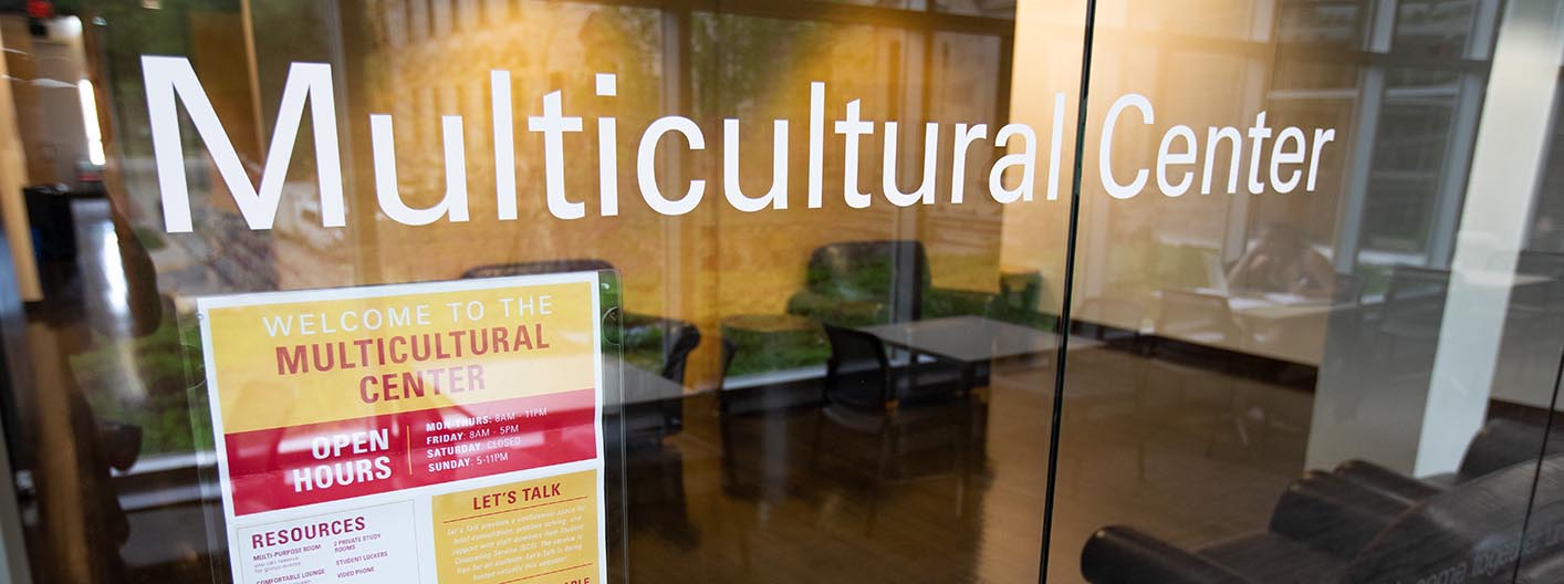 A look through the glass exterior of the Multicultural Center in the Memorial Union.