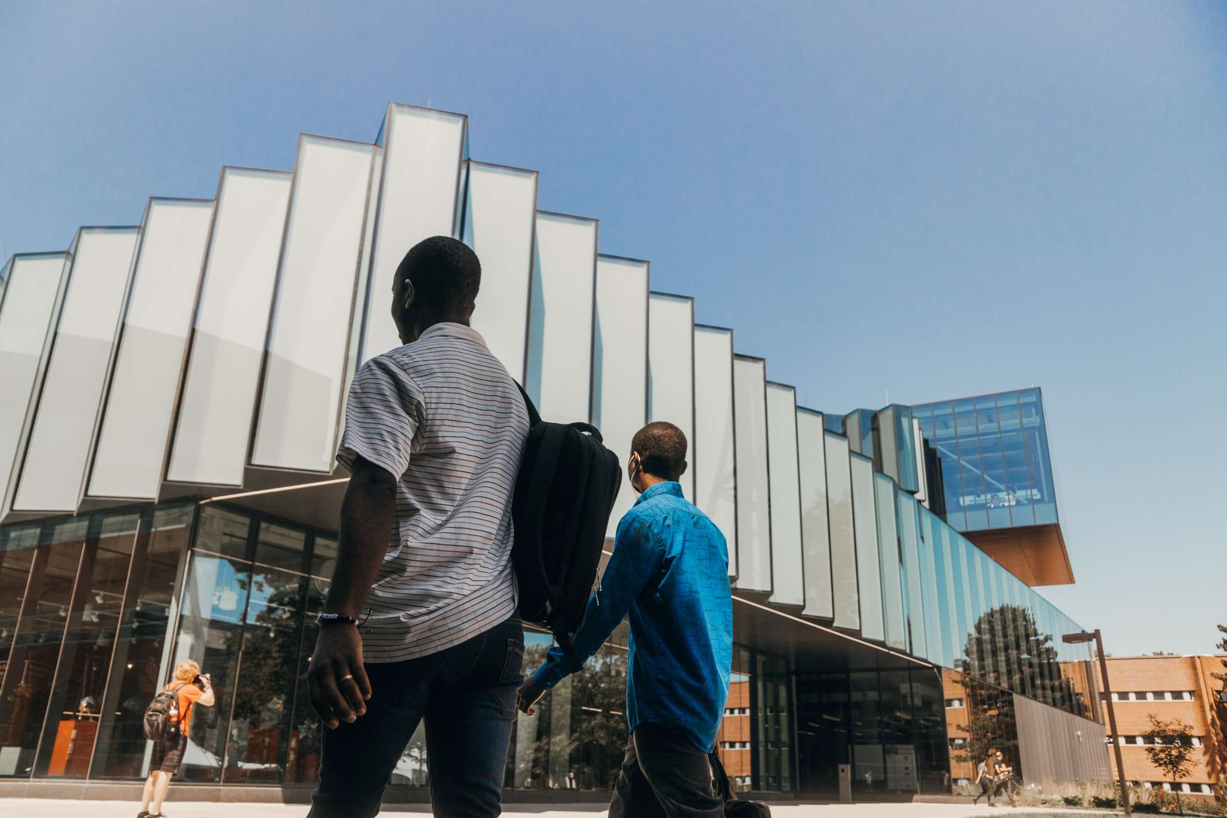Students walking in front of the Student Innovation Center